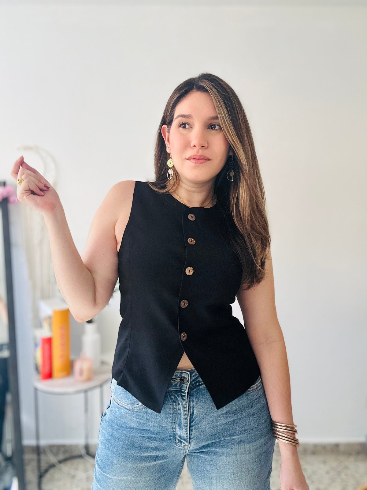 black buttoned vest